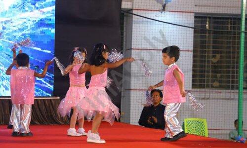Students performing a traditional dance at Chanakya International School annual event